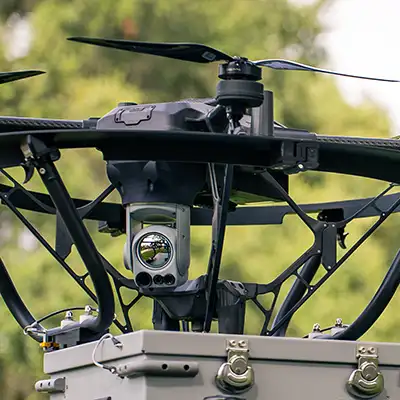 Underside view of Hoverfly’s Spectre 2.0 drone during tethered flight, showing the central section and suspension system